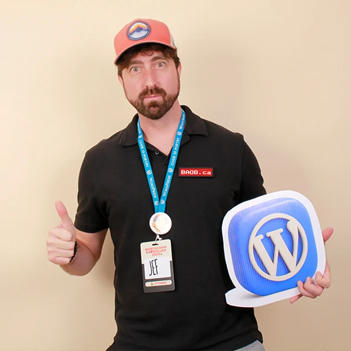 Jef van de Graaf holding a WordPress logo at WordCamp Bangkok