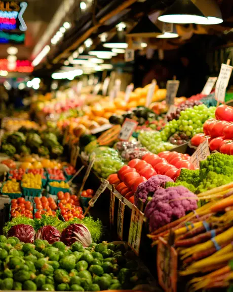 A market stall stacked with fruit and vegetables